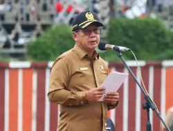 Mingrum Gumay Bacakan Sambutan Gubernur